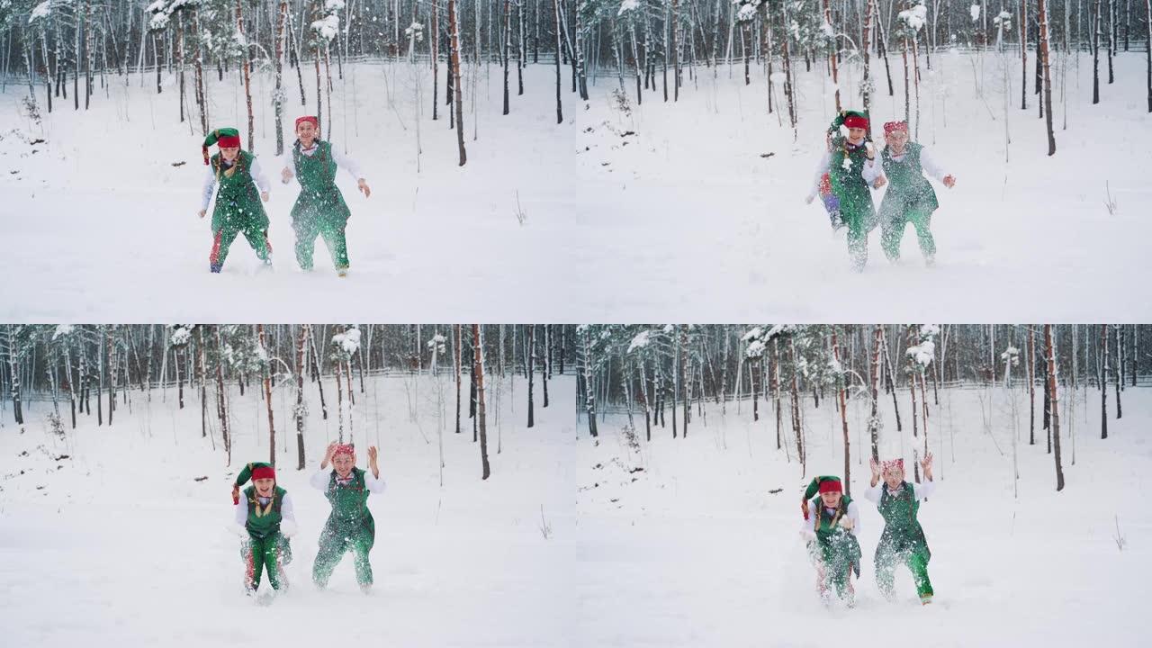 两个戴着帽子的绿色西装的精灵在冬季森林的背景上玩耍和扔雪。