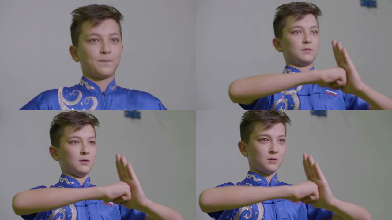 少年少年握拳表现出传统的功夫称呼