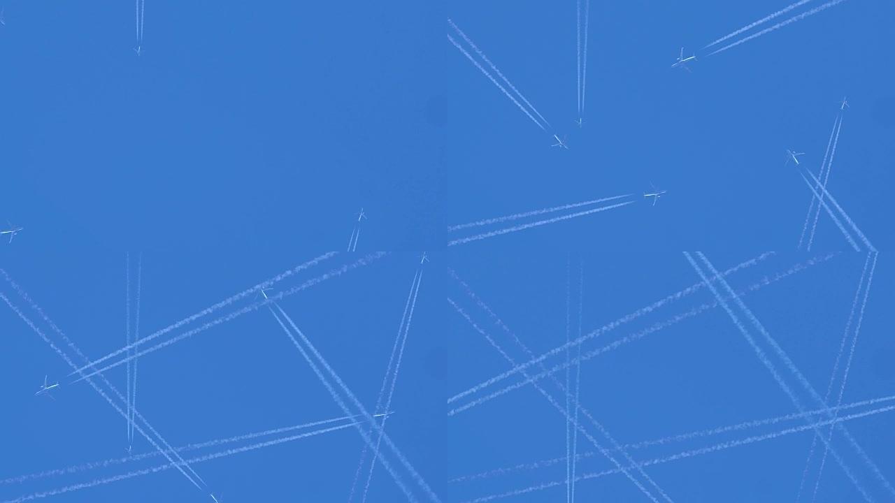 空中交通。蓝净天空上飞机射流层白色微量蒸气的视图