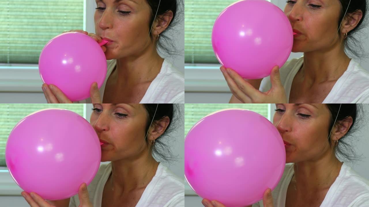 女人在特写镜头中吹气球