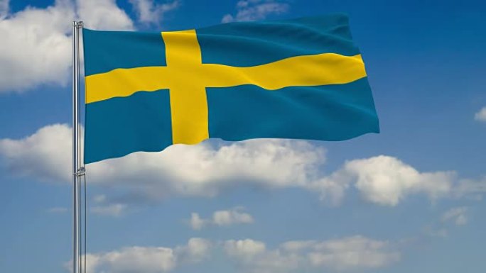 蓝蓝的天空中飘浮着瑞典国旗