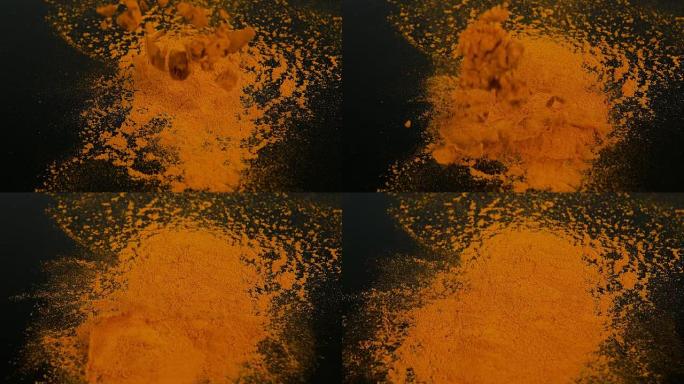 姜黄，姜黄，黑色背景下的粉末，印度香料，慢动作4K