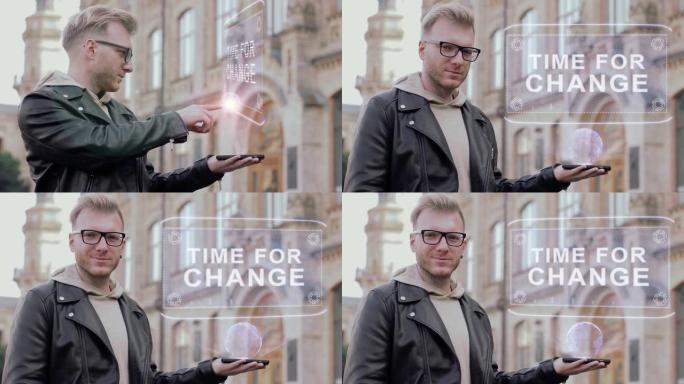 戴眼镜的聪明年轻人显示了变化的概念全息图时间