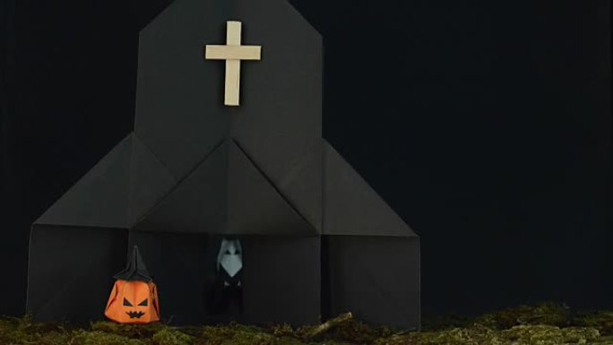 HD万圣节镜头折纸，南瓜头杰克-o-灯放在前面的黑色教堂有修女移动缓慢内，突然在镜头结束的场景前面移