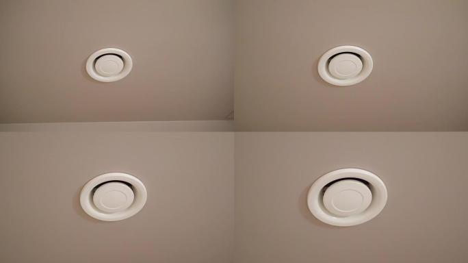 浴室天花板上的白色排气孔