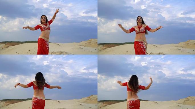 户外跳肚皮舞的美女