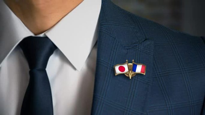 商人带着朋友国旗走向相机日本-法国