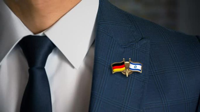 商人走向相机与朋友国家国旗别针德国-以色列