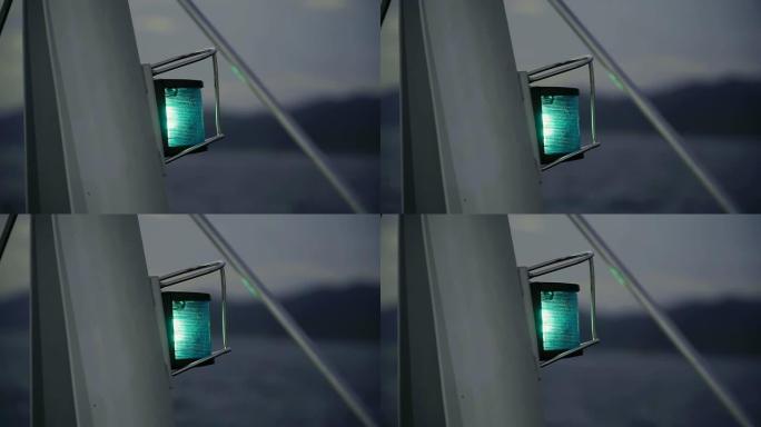 在游艇上航行时近距离拍摄导航蓝光。