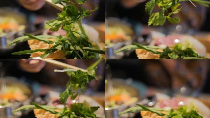 餐馆的寿喜烧火锅芹菜。