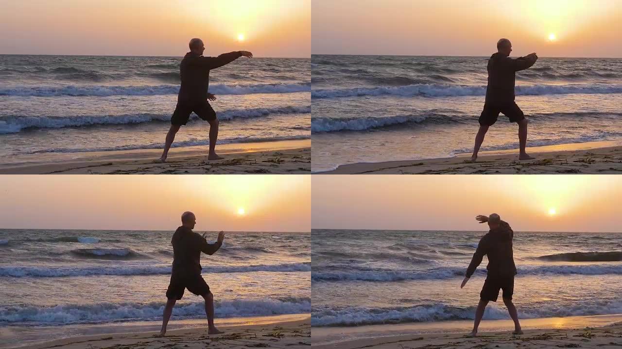 运动男子早上在海滩上练习武术时推手