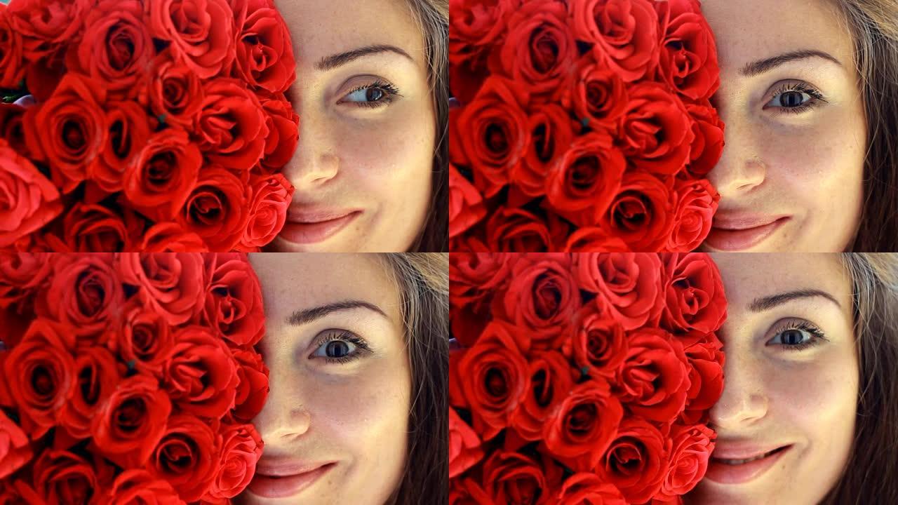 面对一个红玫瑰美丽的年轻女子的特写镜头。广告。广告。