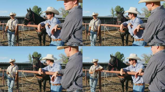 牛仔在马牧场上一起聊天
