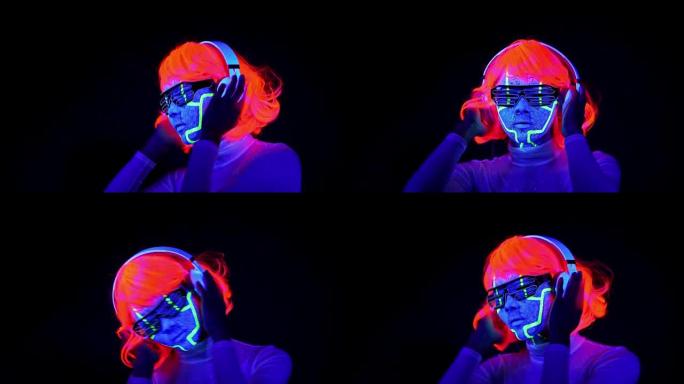 女人用紫外线半机械人的脸漆，假发，发光的眼镜，服装跳舞，用耳机听音乐。亚洲女人。。