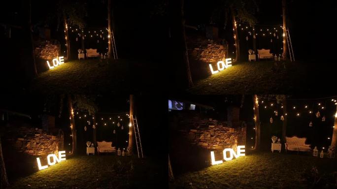 高清拍摄夜间婚礼用灯光装饰的院子