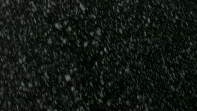 黑色屏幕上的圣诞暴风雪vfx元素。