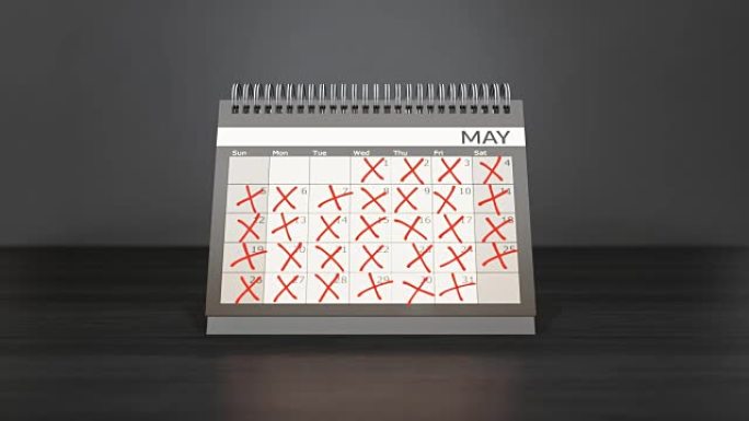 在书桌年日历上的月历中标记天数。