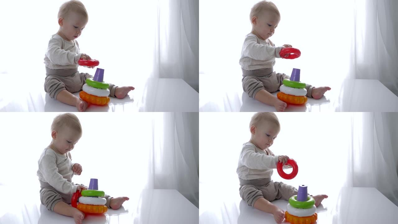 益智玩具快乐男婴在家玩彩色金字塔