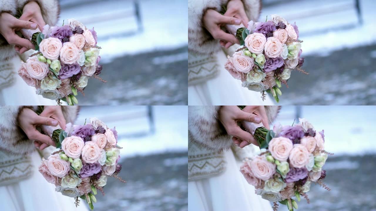 新娘手中的特写婚礼花束。冬季婚礼
