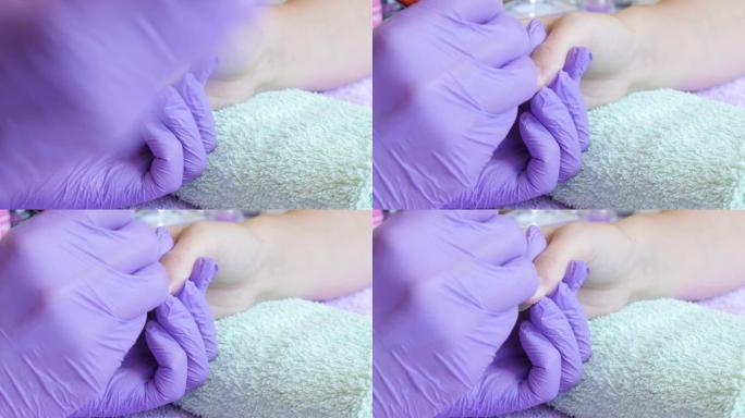 女性在沙龙中修指甲工作细节4K 3840X2160 UltraHD视频-美容和水疗工作室中女性指甲油