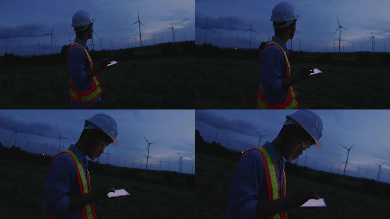 工程师在夜间进行风力涡轮机评估，慢动作