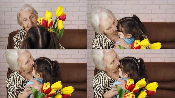 一个小女孩给祖母送花。