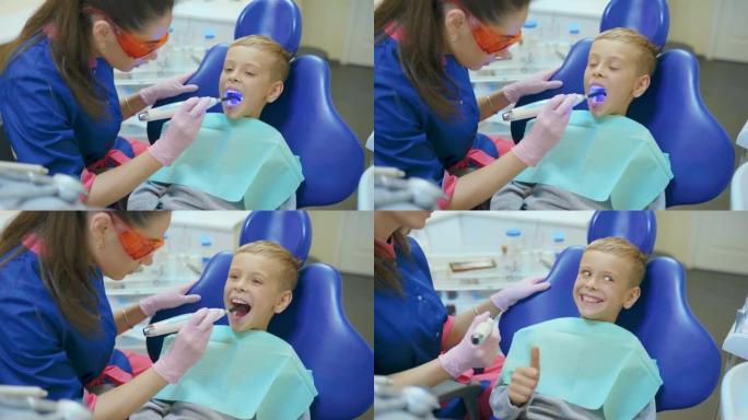 牙医在现代诊所治疗他的牙齿和充填腔