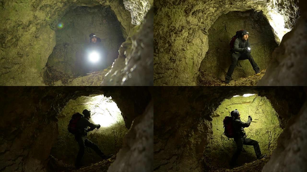 带着手电筒的救援人员在深洞里四处张望。救援任务。