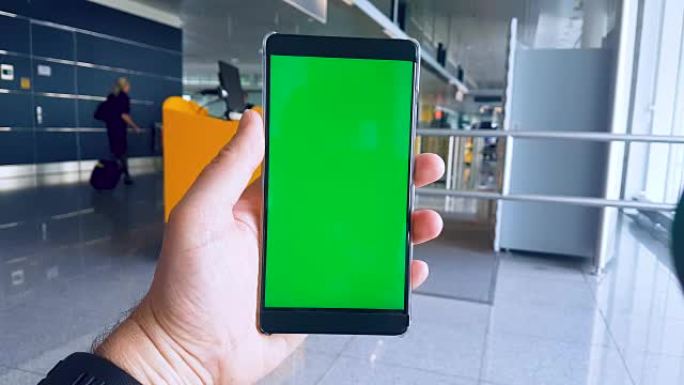 机场的4k视频显示手机上的绿屏