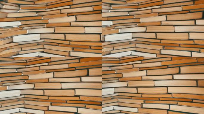 成堆的书漂亮地堆成一排