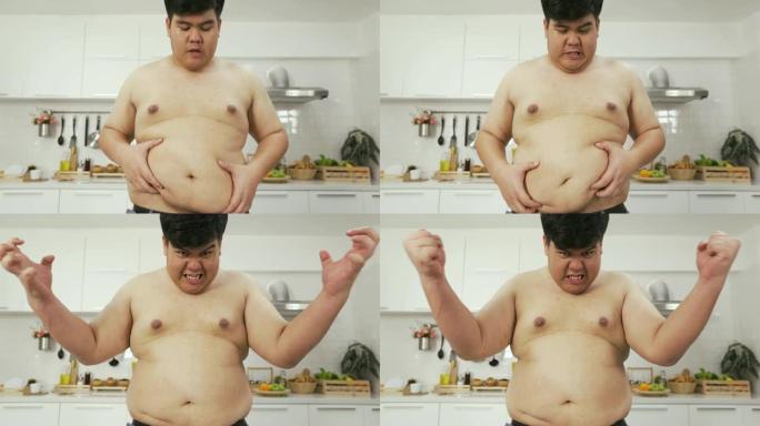 前视图: 泰国超重男子因大肚子而感到愤怒
