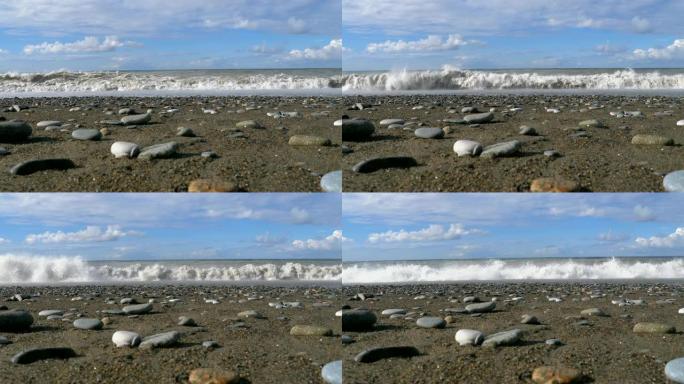 海上风暴。石岸的仰视图。巨大的海浪在海滩上撞击