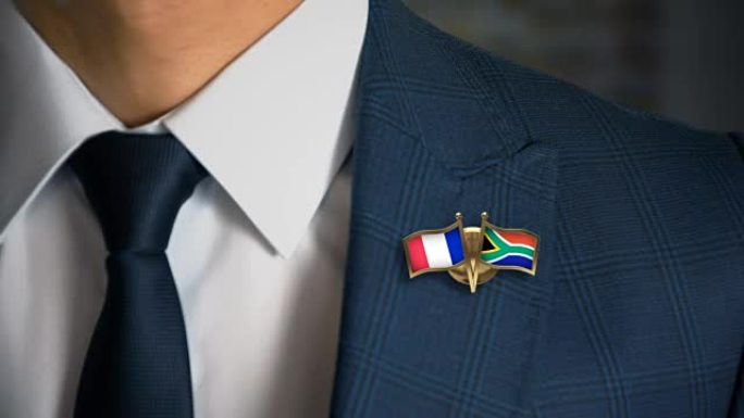 商人走向相机与朋友国家国旗别针法国-南非