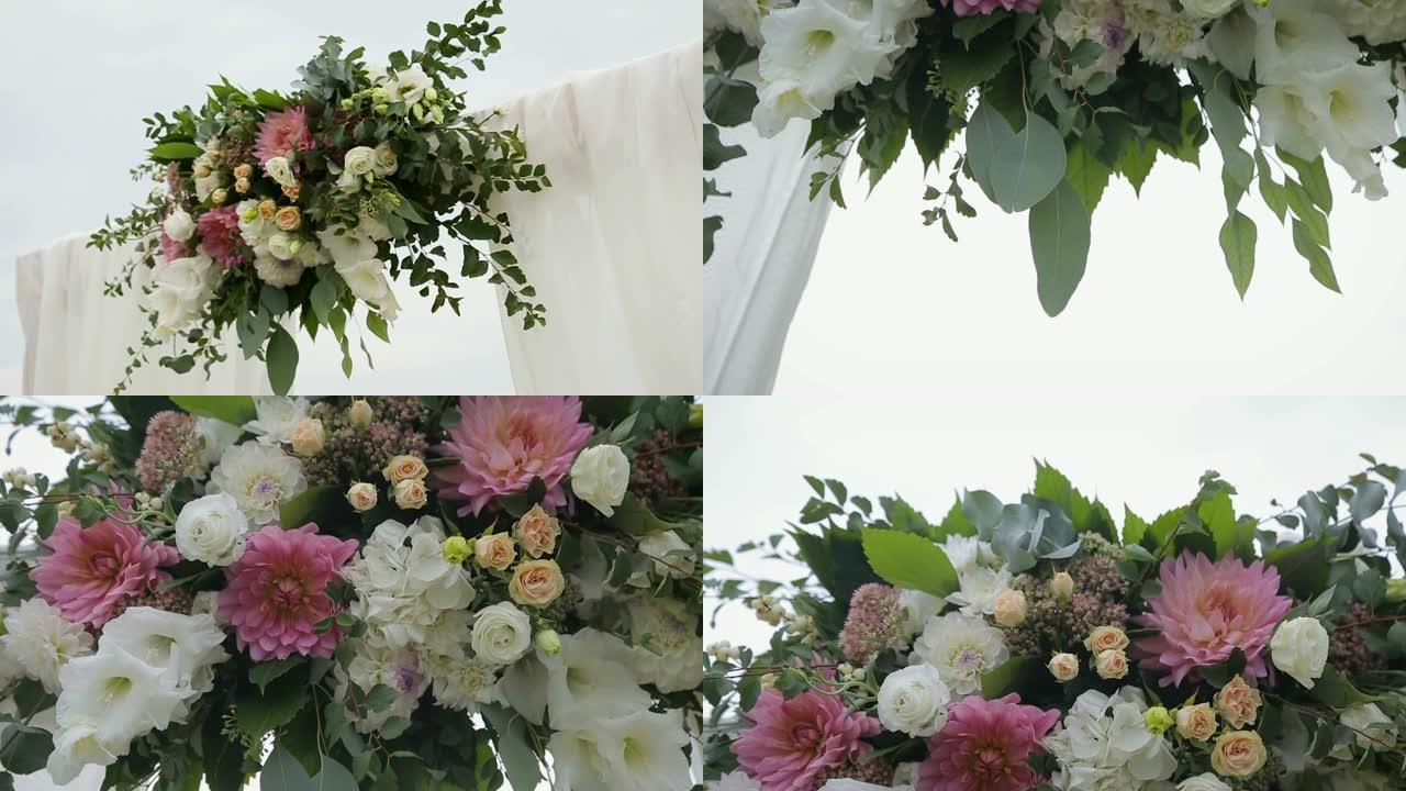 婚礼花拱门装饰。用鲜花装饰的婚礼拱门。