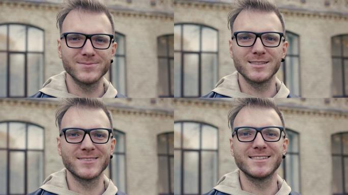 情感视频-一个戴眼镜的蓝眼睛男人的肖像