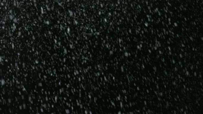 黑色屏幕上的圣诞暴风雪vfx元素。