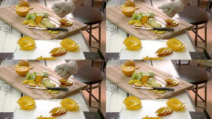 厨师用柠檬汁手工加工苹果片。