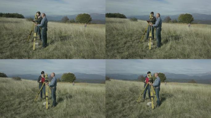 测量师在山顶上测量