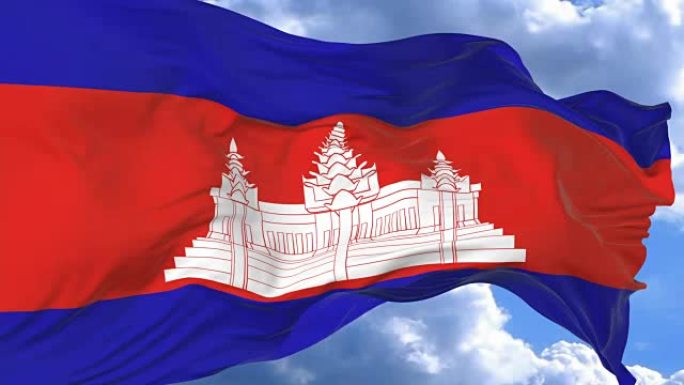 在柬埔寨蔚蓝的天空中挥舞着旗帜