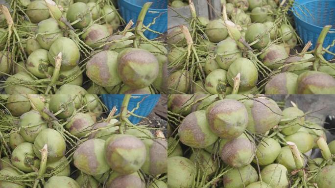 泰国街头卖椰子和果汁。