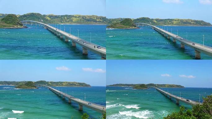 新鲜的绿色海啸桥和蓝色的大海
