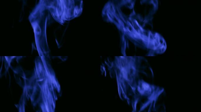 蓝色蒸汽从上升。黑色背景上的蓝色烟雾。黑色背景下的烟雾慢慢漂浮在太空中。4K UHD
