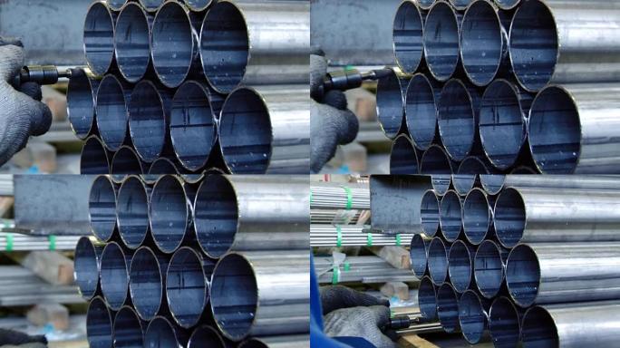 工厂用手加工不锈钢异型管的磨边。