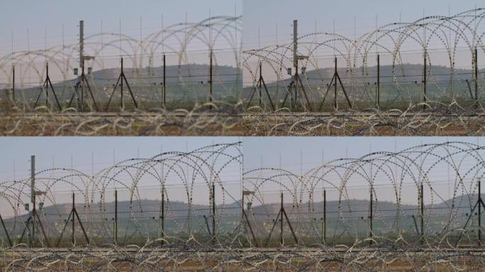 以色列和西岸之间的边界围栏。铁丝网电子围栏。