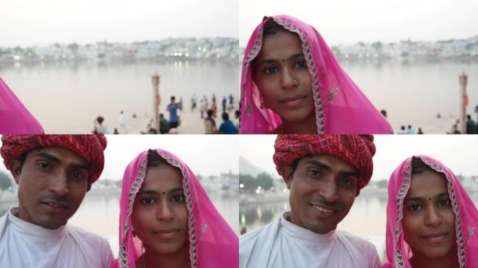 潘在印度普什卡关闭美丽的印度夫妇与纱丽和头巾