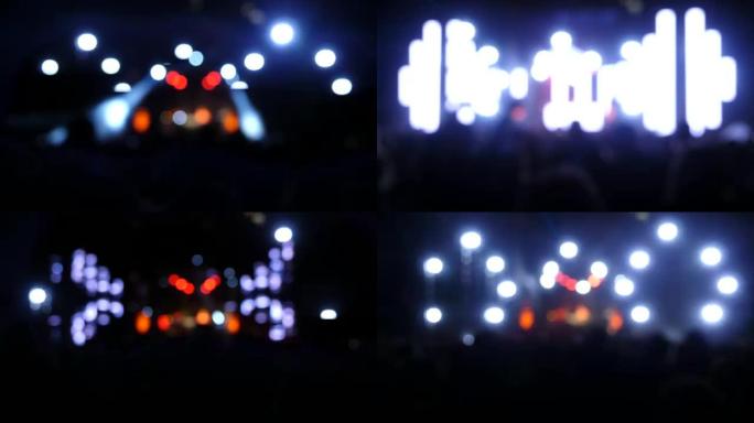 音乐会上的探照灯。bokeh在音乐节上的影响。电子音乐节上的一幕。