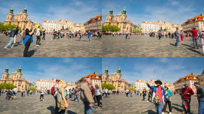 阳光明媚的日子，游客在布拉格老城广场上狼吞虎咽
