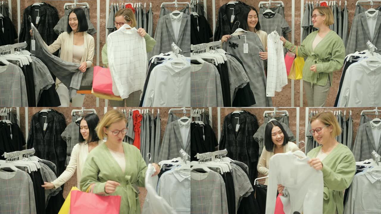 造型师在购物中心的商店为女性选择一套休闲服