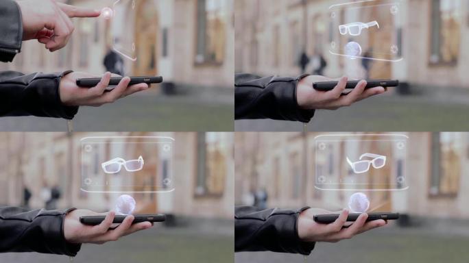 男性手在智能手机概念性平视显示器全息眼镜上展示