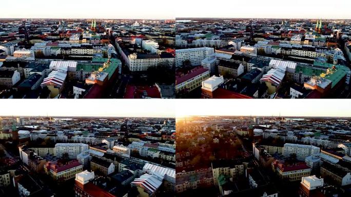 秋天赫尔辛基市的鸟瞰图。天空和云以及五颜六色的建筑物。无人机在城市上空平移。芬兰赫尔辛基。